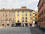 buildings lining courtyard in Modena Italy