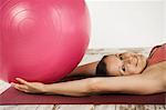 Woman Doing Pilates With Fitness Ball, Munich, Bavaria, Germany, Europe