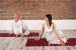 Couple Practising Yoga