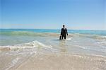 Young businessman in the water