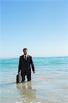 Handsome businessman in the sea