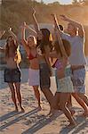 Group of friends dancing together