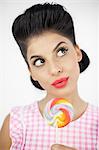 Cute young pinup with a lollipop