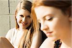 Close-up portrait of young women outdoors