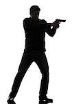 one man killer policeman aiming gun standing silhouette studio white background