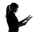 one business woman computer computing typing digital tablet  silhouette studio isolated on white background