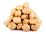 Big heap of raw potatoes isolated on white background