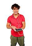 Guy enjoying music having headphones attached to tablet