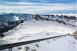 Winter with ski slopes of kaprun resort next to kitzsteinhorn peak in austrian alps