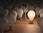 Incandescent bulb with an idea. Concept of leadership.