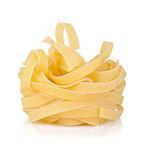 Fettuccine nest pasta. Isolated on white background