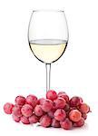 White wine glass with red grapes. Isolated on white