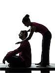 one man and woman performing thai massage in silhouette studio on white background