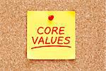 Core Values written on yellow sticky note with red marker.