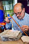 Portrait of a jewelry maker carrying out filigree work, Essaouira, formerly Mogador, UNESCO World Heritage Site, Morocco, North Africa, Africa