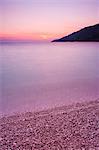 Adriatic Sea at Zlatni Rat Beach at sunset, Bol, Brac Island, Dalmatian Coast, Croatia, Europe