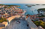 Hvar Town and tourists at Hvar Spanish Fort (Fortica) at sunset, Hvar Island, Dalmatian Coast, Adriatic, Croatia, Europe