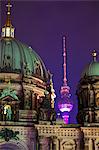 Close-up of the Berliner Dom (Cathedral) with the Television Tower in the background at night, Berlin, Germany, Europe