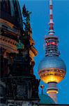 Close-up of the Berliner Dom (Cathedral) with the Television Tower in the background at night, Berlin, Germany, Europe