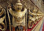 Garudas and nagas on external decorations of the Ubosoth, Wat Phra Kaew temple, Grand Palace, Bangkok, Thailand