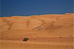Four wheel drive on desert dunes, Wahiba, Oman, Middle East