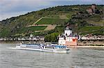 Cruise ship passing the Mouse Tower of Bingen in the Rhine valley, Rhineland-Palatinate, Germany, Europe