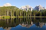 Reflections at sunset on Antorno Lake, Misurina, Tre Cime di Lavaredo, Belluno, Dolomites, Italy, Europe