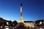 Statue of Portugal's King Dom Pedro IV, Dona Maria II national theatre at night, Rossio Square, Baixa district, Lisbon, Portugal, Europe