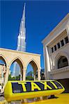 Burj Khalifa and taxi, Dubai, United Arab Emirates, Middle East