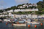 Fishing boats and sailing yachts moored in Looe harbour, Cornwall, England, United Kingdom, Europe