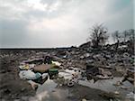 Burnt out wasteland occupied by travellers, Saint Denis, France