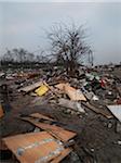 planks in  burnt out wasteland occupied by travellers, Saint Denis, France