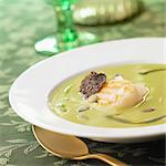 Cream of pea soup with scallops