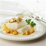Piece of cod with roast apples and honey sauce