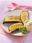 Roasted bananas with sesame seeds,yoghurt ice cream