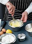 Mixing together the sugar and the butter for the cake dough