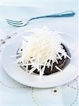 Chocolate fondant with macadamia nuts and thinly chopped pears