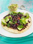 Mexican galette with azuki beans,lettuce,tomatoes,red cabbage and lime