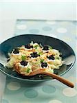 Grated apple and carrot salad with coconut milk gelatine squares topped with truffles