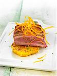 Duck with orange and chives