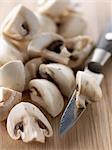 Slicing the button mushrooms
