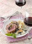 Stuffed rolled pork with creamy Swiss chard