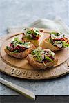 Rocket lettuce,confit tomato and parmesan Bruschetta