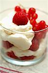 Whipped cream with raspberries and redcurrants