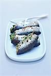 Grilled sardines stuffed with snail butter