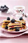 Club sandwich-style french toast with rose and blackberry jam