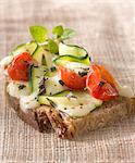 Morbier,zucchini, tomato and fresh herb toasted open sandwich