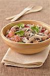 Long grain rice salad with diced bacon,grapefruit,mushrooms and fresh spinach