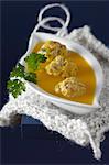 Butternut squash soup with green olive meatballs