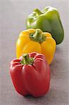 Three different colored bell peppers